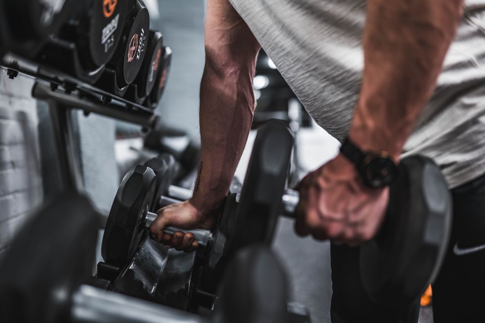 Lifting dumbbells from a rack